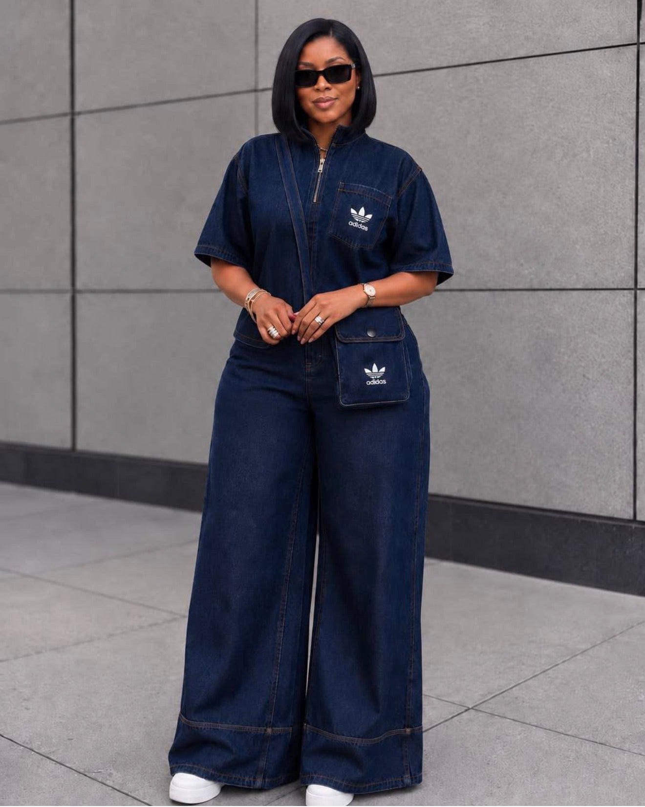 Luxe Indigo Denim Jumpsuit With cross bag.