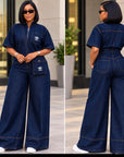 Luxe Indigo Denim Jumpsuit With cross bag.